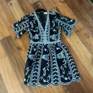 Beautiful Socialite black and silver lace dress size S. Zip back